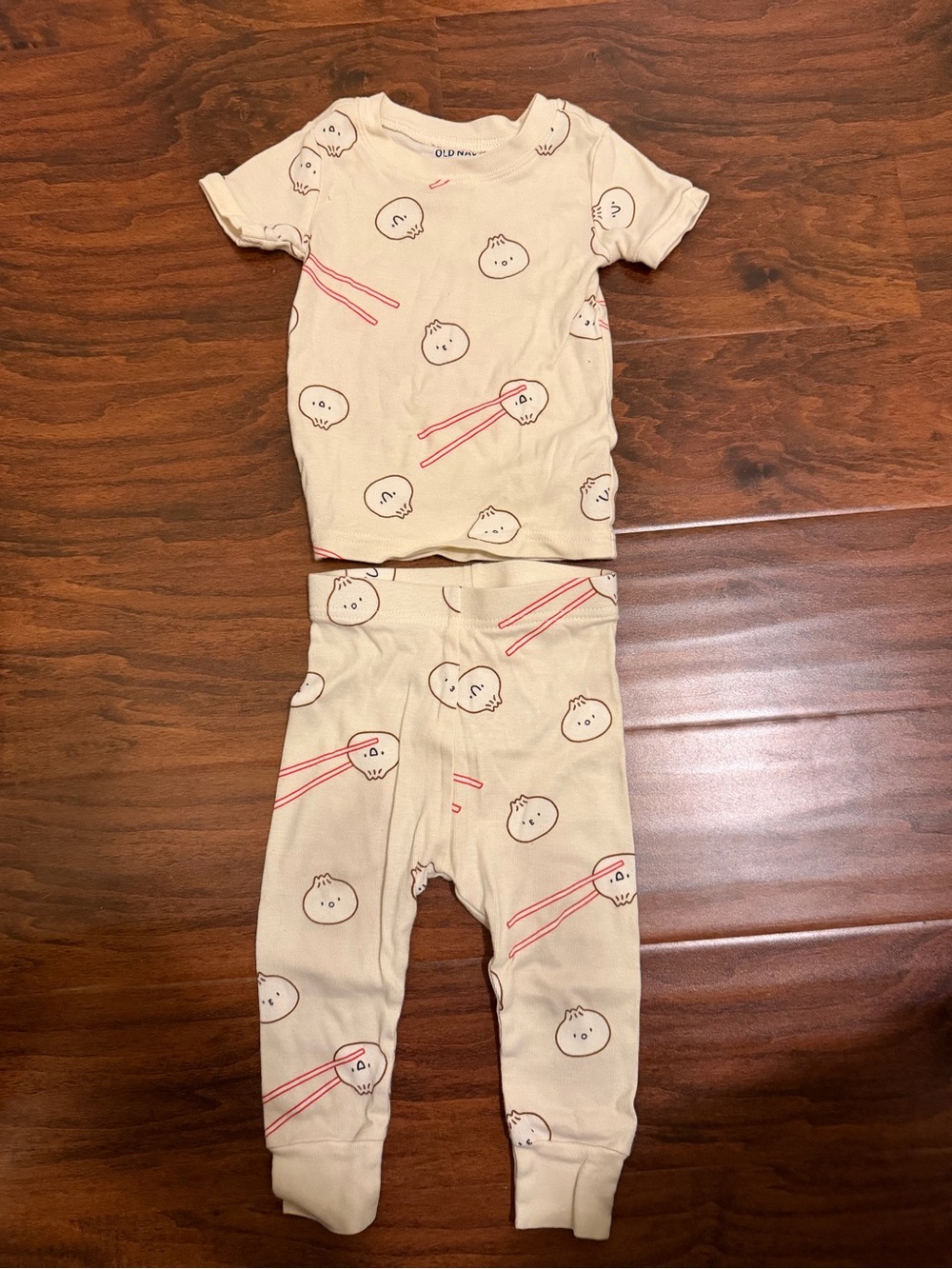 12-18 Old Navy Cream Kids Pajama Set with dumplings and chopsticks